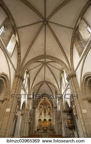 Stock Photo - "Interior of the Romanesque St. Peter's Cathedral, nave, transept and altar, 1277, Osnabruck, Lower Saxony, Germany, Europe". Fotosearch