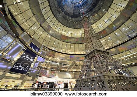 Stock Image - "Interior, Quartier Q207, Galeries Lafayette department store with a replica of the Eiffel Tower, architect Jean Nouvel, Friedrichstadt-Passagen arcades, Friedrichstadt, Berlin, Berlin, Germany, Europe". Fotosearch