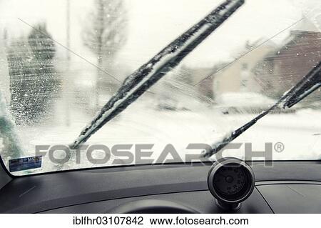 "Interior view, smeared windscreen of a car with wipers, Grevenbroich, Rhineland, North Rhine-Westphalia, Germany, Europe" View Large Photo Image Stock Image - "Interior view, smeared windscreen of a car with wipers, Grevenbroich, Rhineland, North Rhine-Westphalia, Germany, Europe". Fotosearch
