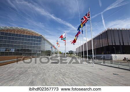 Stock Image - "International flags between the European Investment Bank, EIB, and the European Court of Justice, European quarter, Kirchberg plateau, Luxembourg City, Europe, PublicGround". Fotosearch