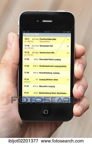 "IPhone, smartphone, showing an app on the display with transport timetables for public transport in Germany" View Large Photo Image Stock Photo - "IPhone, smartphone, showing an app on the display with transport timetables for public transport in Germany". Fotosearch