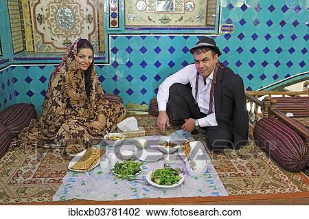 "Iranian wedding couple having lunch in a traditional restaurant, Bazaar, Isfahan, Isfahan Province, Persia, Iran, Asia" View Large Photo Image Stock Image - "Iranian wedding couple having lunch in a traditional restaurant, Bazaar, Isfahan, Isfahan Province, Persia, Iran, Asia". Fotosearch