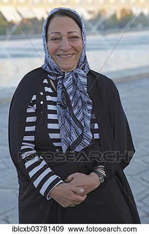 Stock Photo - "Iranian woman wearing a headscarf, Isfahan, Isfahan Province, Persia, Iran, Asia". Fotosearch