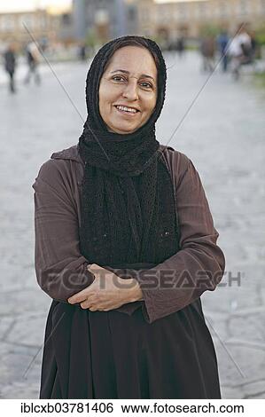 "Iranian woman wearing a headscarf, Isfahan, Isfahan Province, Persia, Iran, Asia" View Large Photo Image Stock Photograph - "Iranian woman wearing a headscarf, Isfahan, Isfahan Province, Persia, Iran, Asia". Fotosearch