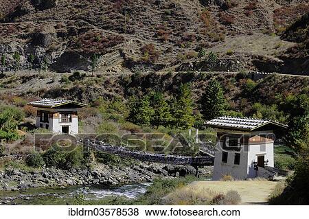 "Iron bridge of the temple of Tachogang Lhakhang crossing the Paro Chu River, Paro district, Bhutan, Asia" View Large Photo Image Stock Photo - "Iron bridge of the temple of Tachogang Lhakhang crossing the Paro Chu River, Paro district, Bhutan, Asia". Fotosearch