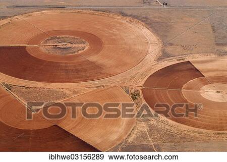 "Irrigation of fodder crops in the desert of New Mexico, Torrance County, Moriarty, Moriarty, New Mexico, United States, North America" View Large Photo Image Stock Photo - "Irrigation of fodder crops in the desert of New Mexico, Torrance County, Moriarty, Moriarty, New Mexico, United States, North America". Fotosearch