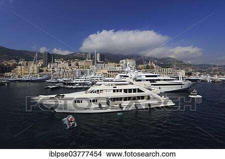 "ISA motor yacht, Olah, in Port Hercule, Principality of Monaco, Mediterranean Sea" View Large Photo Image Picture - "ISA motor yacht, Olah, in Port Hercule, Principality of Monaco, Mediterranean Sea". Fotosearch