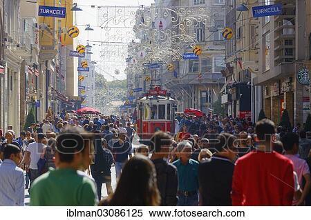 Stock Photography - "Istiklal Street or Istiklal Caddesi and a historic tram, Beyoglu, Istanbul, European side, Istanbul Province, Turkey, European side, Europe". Fotosearch