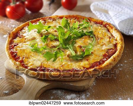 Stock Photo - Italian cheese pizza with rocket. Fotosearch