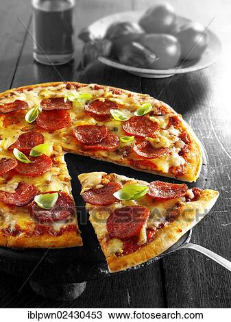 Italian pepperoni pizza View Large Photo Image Stock Image - Italian pepperoni pizza. Fotosearch