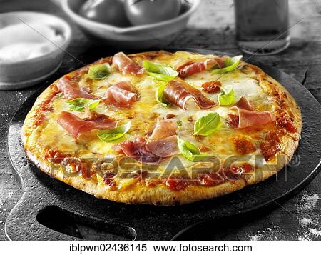 Stock Photography - Italian prosciutto ham pizza. Fotosearch