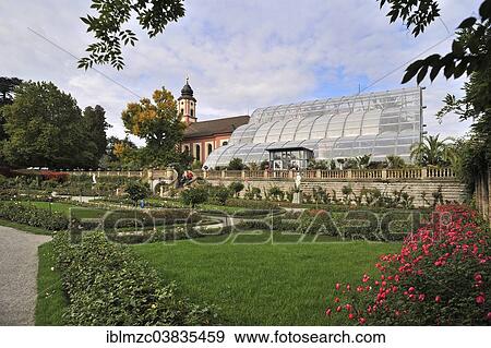 Stock Photo - "Italian Rose Garden with the Palm House and the Castle Church St. Marien, Mainau, Baden-Wurttemberg, Germany, Europe". Fotosearch