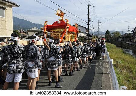 "Iwakura Matsuri festival in autumn, worshippers carrying a Shinto shrine through the town, Kyoto, Japan, East Asia, Asia" View Large Photo Image Picture - "Iwakura Matsuri festival in autumn, worshippers carrying a Shinto shrine through the town, Kyoto, Japan, East Asia, Asia". Fotosearch