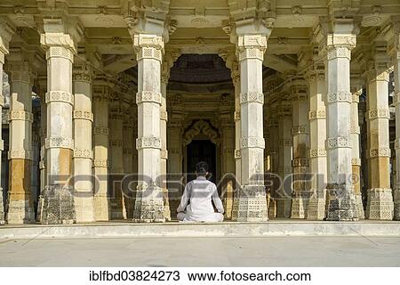 Stock Image - "Jain pilgrim meditating, Palitana temples, Mount Shatrunjaya, Palitana, Gujarat, India, Asia". Fotosearch