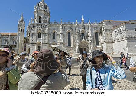 Stock Photo - "Japanese tourists in front of the Mosteiro dos Jeronimos, Jeronimos Monastery, UNESCO World Cultural Heritage Site, Belem, Lisbon, Lisbon District, Portugal, Europe". Fotosearch