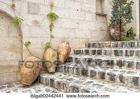 Stock Image - "Jars decorating stairs, Mustafapasa, Cappadocia, Anatolia, Turkey, Asia". Fotosearch