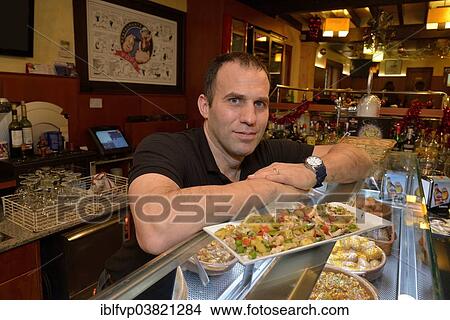 "Javier Olivas, owner of the """"Pope"""" tapas bar, La Lonja district, Palma, Mallorca, Balearic Islands, Spain, Europe" View Large Photo Image Picture - "Javier Olivas, owner of the """"Pope"""" tapas bar, La Lonja district, Palma, Mallorca, Balearic Islands, Spain, Europe". Fotosearch