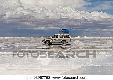 "Jeep, salt piles, Salar de Uyuni, near Colchani, Altiplano, Bolivia, South America" View Large Photo Image Stock Image - "Jeep, salt piles, Salar de Uyuni, near Colchani, Altiplano, Bolivia, South America". Fotosearch