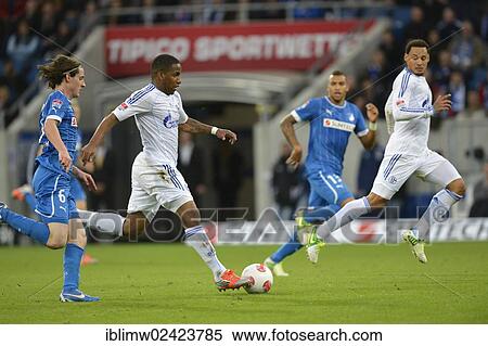 Stock Photography - Jefferson Farfan, Schalke 04, on the ball, left Sebastian Rudy, TSG 1899 Hoffenheim, right Joel Matip, Schalke 04, Wirsol Rhein-Neckar-Arena in Sinsheim-Hoffenheim, Baden-Wuerttemberg, Germany, Europe. Fotosearch