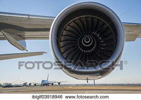 Stock Photograph - "Jet engine, Airbus A340 turbine, an Airbus A380 on a runway at the back, South Africa, Africa". Fotosearch