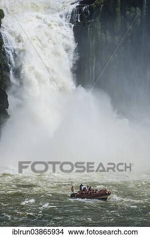 "Jetboat underneath the Iguazu Falls, Iguazu National Park, UNESCO World Heritage Site, Argentina, South America" View Large Photo Image Picture - "Jetboat underneath the Iguazu Falls, Iguazu National Park, UNESCO World Heritage Site, Argentina, South America". Fotosearch