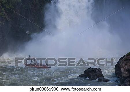 "Jetboat underneath the Iguazu Falls, Iguazu National Park, UNESCO World Heritage Site, Argentina, South America" View Large Photo Image Stock Image - "Jetboat underneath the Iguazu Falls, Iguazu National Park, UNESCO World Heritage Site, Argentina, South America". Fotosearch