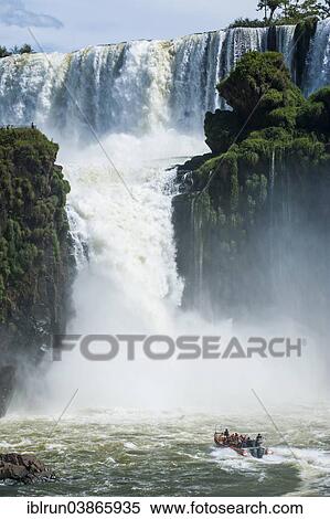 "Jetboat underneath the Iguazu Falls, Iguazu National Park, UNESCO World Heritage Site, Argentina, South America" View Large Photo Image Stock Photography - "Jetboat underneath the Iguazu Falls, Iguazu National Park, UNESCO World Heritage Site, Argentina, South America". Fotosearch