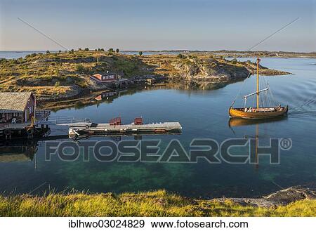 "Jetty and tourist boat in small bay, Geitoya island at back, Averoy, More og Romsdal, Western Norway, Norway, Europe" View Large Photo Image Stock Photo - "Jetty and tourist boat in small bay, Geitoya island at back, Averoy, More og Romsdal, Western Norway, Norway, Europe". Fotosearch
