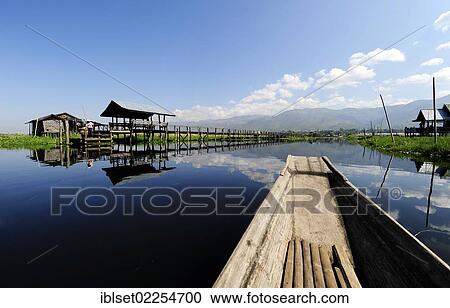 "Jetty at Inle Lake, from a boat, Burma, Myanmar, Southeast Asia, Asia" View Large Photo Image Stock Image - "Jetty at Inle Lake, from a boat, Burma, Myanmar, Southeast Asia, Asia". Fotosearch