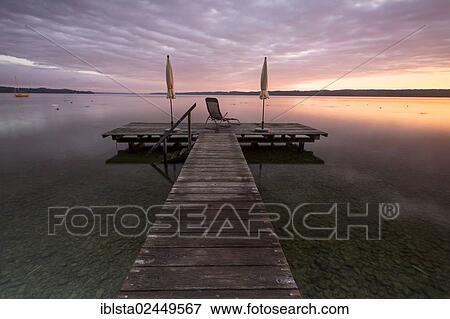 "Jetty, early morning mood on Lake Starnberg, Bavaria, Germany, Europe, PublicGround, Europe" View Large Photo Image Stock Photo - "Jetty, early morning mood on Lake Starnberg, Bavaria, Germany, Europe, PublicGround, Europe". Fotosearch