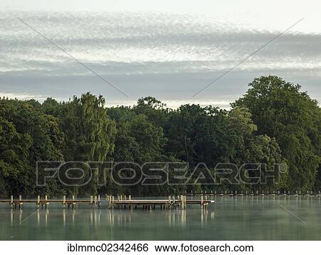 "Jetty in Lake Woerthsee, Bavaria, Germany, Europe" View Large Photo Image Stock Photograph - "Jetty in Lake Woerthsee, Bavaria, Germany, Europe". Fotosearch