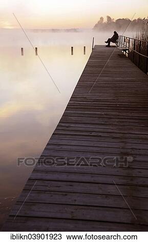 "Jetty in the morning mist, lake Westensee, Kiel, Schleswig-Holstein, Germany, Europe" View Large Photo Image Stock Image - "Jetty in the morning mist, lake Westensee, Kiel, Schleswig-Holstein, Germany, Europe". Fotosearch
