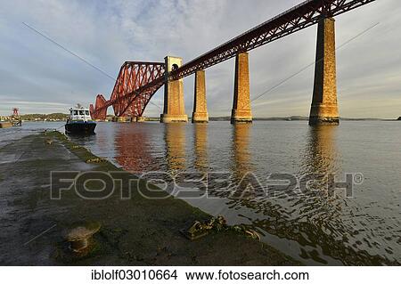 "Jetty next to Forth Bridge railway bridge across Firth of Forth, Queensferry, Edinburgh, Scotland, United Kingdom, Europe" View Large Photo Image Picture - "Jetty next to Forth Bridge railway bridge across Firth of Forth, Queensferry, Edinburgh, Scotland, United Kingdom, Europe". Fotosearch