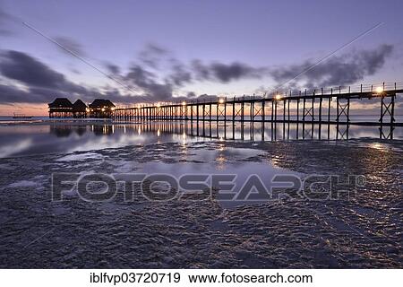 Stock Photo - "Jetty of the Dongwe Club Hotel at dawn, Dongwe Beach, Dongwe, Zanzibar, Tanzania, Africa". Fotosearch