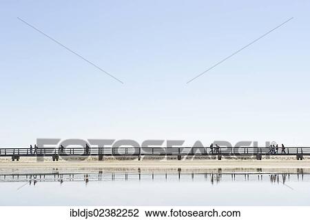"Jetty on the beach of St. Peter-Ording, North Frisia, Schleswig-Holstein, Germany, Europe" View Large Photo Image Stock Image - "Jetty on the beach of St. Peter-Ording, North Frisia, Schleswig-Holstein, Germany, Europe". Fotosearch