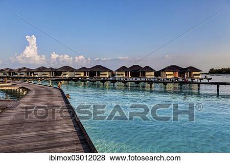 "Jetty, water bungalows on Paradise Island, Lankanfinolhu, North Male Atoll, Maldives, Asia" View Large Photo Image Stock Photo - "Jetty, water bungalows on Paradise Island, Lankanfinolhu, North Male Atoll, Maldives, Asia". Fotosearch