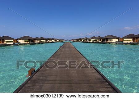 Stock Photo - "Jetty, water bungalows on Paradise Island, Lankanfinolhu, North Male Atoll, Maldives, Asia". Fotosearch