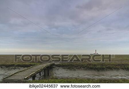 "Jetty, Westerheversand, the lighthouse at the back, Eiderstedt, Northern Friesland, Schleswig-Holstein, Germany, Europe" View Large Photo Image Stock Photo - "Jetty, Westerheversand, the lighthouse at the back, Eiderstedt, Northern Friesland, Schleswig-Holstein, Germany, Europe". Fotosearch
