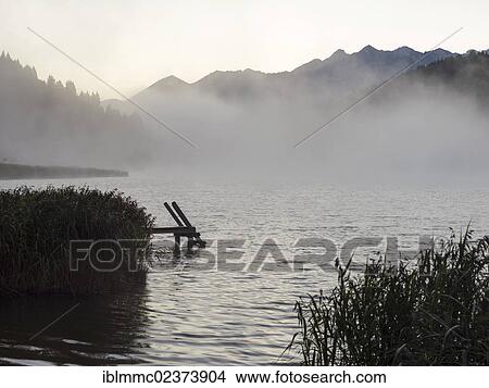 "Jetty with a ladder at Geroldsee lake in the morning mist, Bavaria, Germany, Europe" View Large Photo Image Picture - "Jetty with a ladder at Geroldsee lake in the morning mist, Bavaria, Germany, Europe". Fotosearch