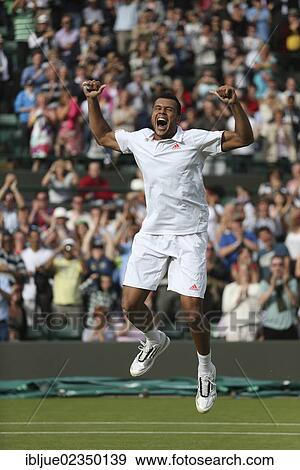 "Jo-Wilfried Tsonga, FRA, jumping into the air, cheering after his victory, Wimbledon Championships 2012 AELTC, ITF Grand Slam Tennis Tournament, London, England, United Kingdom, Europe" View Large Photo Image Stock Photo - "Jo-Wilfried Tsonga, FRA, jumping into the air, cheering after his victory, Wimbledon Championships 2012 AELTC, ITF Grand Slam Tennis Tournament, London, England, United Kingdom, Europe". Fotosearch