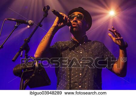 Stock Photo - "Joe Dukie, singer of New Zealand band Fat Freddy's Drop, live at the Blue Balls Festival, Lucerne, Switzerland, Europe". Fotosearch