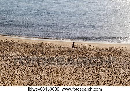 "Jogger at the beach, Beirut, Lebanon, Asia" View Large Photo Image Stock Photograph - "Jogger at the beach, Beirut, Lebanon, Asia". Fotosearch