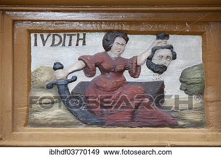 "Judith holding the head of Holofernes, wood carving, Alte Lateinschule Alfeld building, Alfeld, Lower Saxony, Germany, Europe" View Large Photo Image Stock Photo - "Judith holding the head of Holofernes, wood carving, Alte Lateinschule Alfeld building, Alfeld, Lower Saxony, Germany, Europe". Fotosearch
