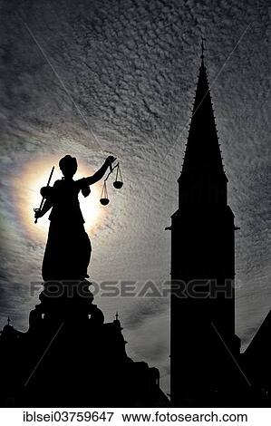 "Justitia statue in front of the silhouette of the Old St. Nicholas Church, Frankfurt am Main, Hesse, Germany, Europe" View Large Photo Image Stock Photo - "Justitia statue in front of the silhouette of the Old St. Nicholas Church, Frankfurt am Main, Hesse, Germany, Europe". Fotosearch