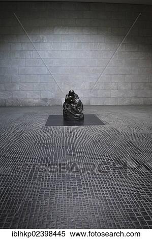 "Kaethe Kollwitz sculpture """"Mother with her Dead Son"""" in the New Guardhouse, Berlin, Germany, Europe" View Large Photo Image Stock Photography - "Kaethe Kollwitz sculpture """"Mother with her Dead Son"""" in the New Guardhouse, Berlin, Germany, Europe". Fotosearch