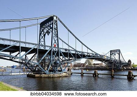 "Kaiser Wilhelm Bridge, historic swing bridge from 1907 in the harbour, Wilhelmshaven, Lower Saxony, Germany, Europe" View Large Photo Image Stock Photo - "Kaiser Wilhelm Bridge, historic swing bridge from 1907 in the harbour, Wilhelmshaven, Lower Saxony, Germany, Europe". Fotosearch