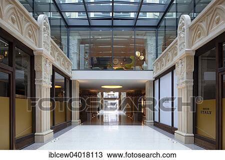 "Kaisergalerie mall, atrium with terrazzo floor, renovated coffered ceiling and 7. 50 meter high sandstone pillars with carved crowns and ornaments, Hamburg, Germany, Europe" View Large Photo Image Stock Image - "Kaisergalerie mall, atrium with terrazzo floor, renovated coffered ceiling and 7. 50 meter high sandstone pillars with carved crowns and ornaments, Hamburg, Germany, Europe". Fotosearch