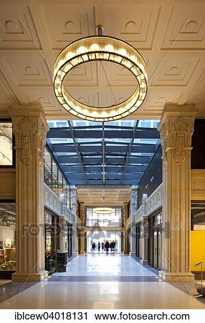 "Kaisergalerie mall, atrium with terrazzo floor, design ring light on renovated coffered ceiling and 7. 50 meter high sandstone pillars with carved crowns and ornaments, Hamburg, Germany, Europe" View Large Photo Image Stock Image - "Kaisergalerie mall, atrium with terrazzo floor, design ring light on renovated coffered ceiling and 7. 50 meter high sandstone pillars with carved crowns and ornaments, Hamburg, Germany, Europe". Fotosearch