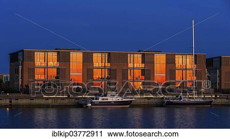 "Kajhusene, pierhouses in the evening light, Frederikssund, Hovedstaden region, Denmark, Europe" View Large Photo Image Stock Image - "Kajhusene, pierhouses in the evening light, Frederikssund, Hovedstaden region, Denmark, Europe". Fotosearch