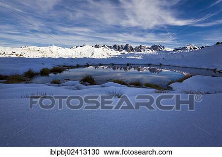 Kalkkoegel Range reflected in the water, Salfains, Tyrol, Austria, Europe View Large Photo Image Stock Image - Kalkkoegel Range reflected in the water, Salfains, Tyrol, Austria, Europe. Fotosearch